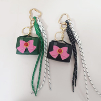 Nouveau porte-clés tendance pour femme avec nœud papillon, mini sac décoratif en PU en forme de sac, cordon de suspension populaire