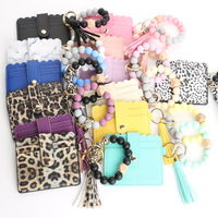 Porte-clés mousqueton classique rectangulaire en acier inoxydable tressé réutilisable, avec pampille en cuir PU, perles, portefeuille et silicone imprimé sérigraphié