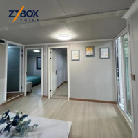 Casa Contenedor Expandible de 40 pies en Verde Salvia, Amueblada, con Plano Abierto, Estructura Blanca, Prefabricada, para Jardín Trasero