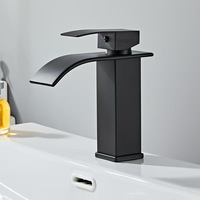 Lavabo à cascade chaude et froide avec table de toilette à poignée unique dans un style moderne