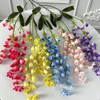 Fleur artificielle en soie faite à la main en gros, fleur de lys suspendue, carillon éolien, imperméable, léger, idéal pour plafond de salle de mariage