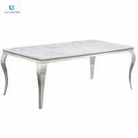 Table à manger en marbre blanc Calacatta naturel Luca |   Pieds en acier argenté poli, plateau rectangulaire, luxe, villa, hôtel, taille personnalisée, USA
