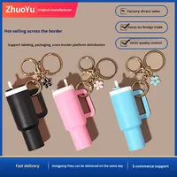 Porte-clés en résine en forme de tyran glacé avec support à rouge à lèvres et motif floral – Style unique