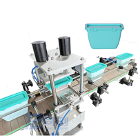 Machine automatique de pressage et de capsulage de couvercle de récipient en plastique de capsule de détergent de blanchisserie à grande vitesse