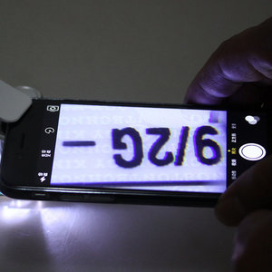 60X هاتف محمول مكبر Loupe مجهر بأشعة تحت البنفسجية عالمي مع مصباح LED صغير بمشبك ضوء أشعة تحت البنفسجية - Product Image 5