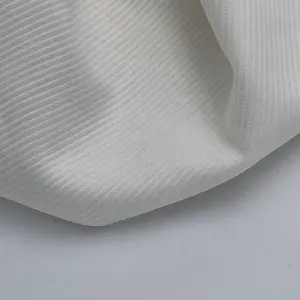 Tissus tricotés unis Spandex en coton microfibre Tissu tricoté pointillé en coton personnalisé pour vêtements