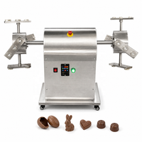Machine de moulage rotative pour chocolat creux, pour la fabrication de figurines et de boules d'œufs de Pâques, équipement commercial oscillant en acier inoxydable
