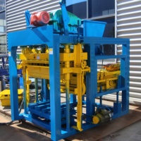 Machine de moulage automatique de blocs de construction QT4-25 pour des opérations fiables en usine de briques, adaptée à l'Afrique du Sud