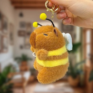 Llavero de peluche de capibara con alas móviles, colgante para teléfono y bolso, para máquina de garras, stock a granel, fabricado en China, de peluche corto y algodón PP - Product Image 4