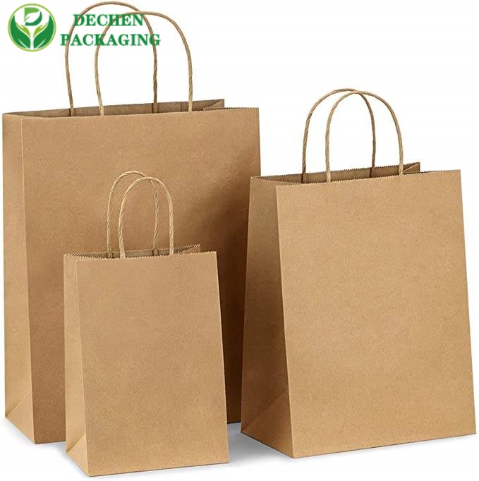 Sacs en papier brun avec poignées pour les achats