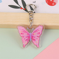 Magnifique porte-clés en acrylique pour filles avec motif imprimé de papillon, idéal pour la décoration de sac à dos
