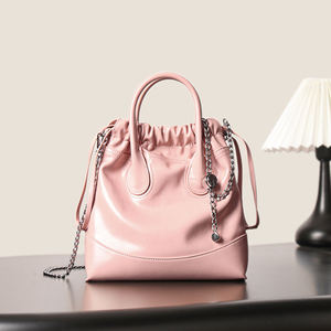 Bolso Tipo Cubo de Cuero Genuino de Alta Gama 2025, Bolso de Hombro Versátil para el Trabajo con Cierre de Botón y Forro de Poliéster - Product Image 2