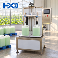 Machine de remplissage d'huile pour grands seaux, machine de remplissage semi-automatique de bouteilles pour la production d'huile de cuisson, de lubrifiant et d'huile comestible