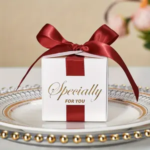 शादी की पार्टी की सजावट के लिए रिबन और मोतियों के साथ पेपर गिफ्ट पैकेजिंग बॉक्स स्क्वायर कैंडी बॉक्स, सबसे सस्ते आइटम उपलब्ध हैं