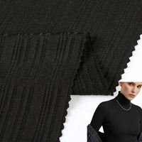 93% polyester 7% spandex couleur unie dty tissu côtelé tricot tissu côtelé irrégulier pour la fabrication de vêtements