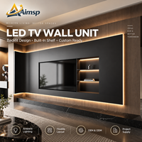 Meuble TV mural noir avec panneau rétroéclairé, console de rangement et armoire TV en noyer pour salon d'appartement meublé