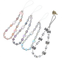 Nouveau style créatif : Lanière de téléphone mignonne avec design ours, carotte et nœud papillon, pendentif caméra CCD, perles de cristal tendance et polyvalentes pour téléphone