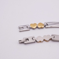 Parure bijoux acier inoxydable poli brillant, placage argent or bicolore, chaîne cœur entrelacé