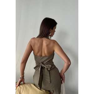 Conjunto de Falda y Chaleco sin Mangas a Rayas Color Caqui al por Mayor, Estilo Minimalista y Ecológico para Mujer, Estilo Normcore - Product Image 1