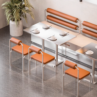 Mobilier d'hôtel commercial de cantine de chaise d'acier inoxydable de style industriel pour la combinaison de table et de chaise de salle à manger de restaurant