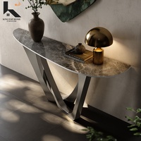 Console d'entrée de luxe avec plateau en pierre frittée et structure en acier inoxydable, table de canapé