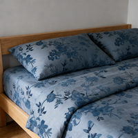 Vente en gros de tissus jacquard respirants élégants de couleur turquoise avec motifs botaniques délicats pour la literie