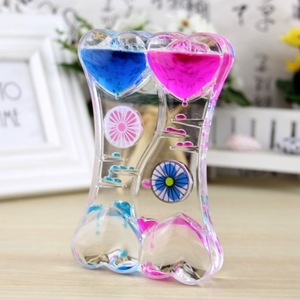 Yu Mo Ornement en acrylique anti-stress en forme de double cœur et goutte d'huile, design sablier bleu rose, jouet cadeau - Product Image 1