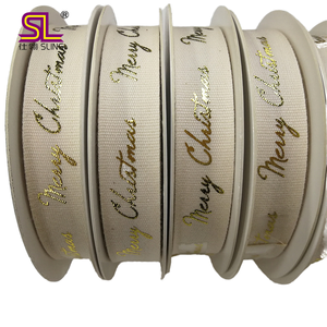 ริบบิ้นโกรเกรนแบบกำหนดเองขนาด 1-1/2 นิ้ว พิมพ์ลายฟอยล์สีทอง "Merry Christmas" ริบบิ้นโพลีเอสเตอร์หน้าเดียวสำหรับตกแต่งในวันหยุด - Product Image 1