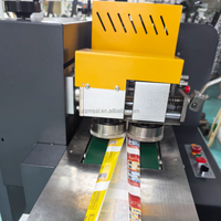 Machine d'emballage de cartes PVC pour cartes à collectionner, avec distributeur à friction et alimentateur de cartes, pour rouleaux de film et de papier