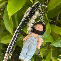 Vente chaude : Pendentif pour tasse à café, chaîne de sac à main, cordon tressé, breloque de sac, accessoires de décoration, avec motifs casque mignon, fille, poupée, chien, perles de culture et pompon