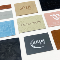 Étiquette en cuir véritable personnalisée de haute qualité avec logo en relief pour sacs et jeans