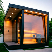 Sauna moderne en cèdre rouge avec cadre noir, verre haut et chauffage à pierres, pour jardin, vente en gros