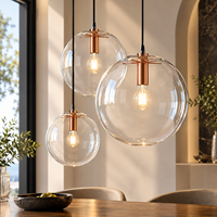 Lampe suspendue LED minimaliste à tête unique en verre de style nordique moderne, disponible en or, or rose et noir