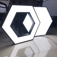 Precio de fábrica superventas hexágono negro luz Led Panel techo luces de trabajo para garaje 2433mm * 4840mm hexágono 165cm Etl
