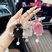 Porte-clés Bouteille de Parfum avec Nœud Papillon et Perles, Anneau de Sac à Main pour Femmes, Portefeuille, Anneau de Voiture, Breloques de Sac pour Filles