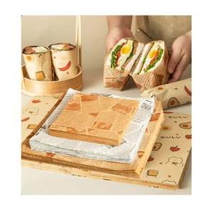 กระดาษไขเกรดอาหารสำหรับห่อเบอร์เกอร์ สีขาวล้วน พิมพ์โลโก้ตามสั่ง กระดาษไขกันน้ำมันสำหรับแซนวิช แบบกำหนดเองได้ - Product Image 1