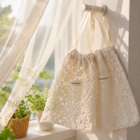 Sac à cordon en crochet ajouré, pochette en maille tricotée à la main en fil de coton, sac cadeau en dentelle florale pour bijoux et cosmétiques