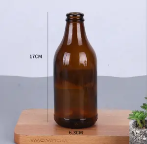 Commercio all'ingrosso rotondo ambra bottiglia di vetro per bere soda acqua bottiglia di birra 300ml con tappo a vite con etichetta personalizzata