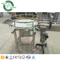 Machine de collecte et de déscramblement de bouteilles carrées pour convoyeur tournant