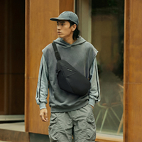 TANGCOOL Sac bandoulière étanche pour homme avec boucle magnétique et compartiments multiples, idéal pour les sports de plein air et les courts séjours