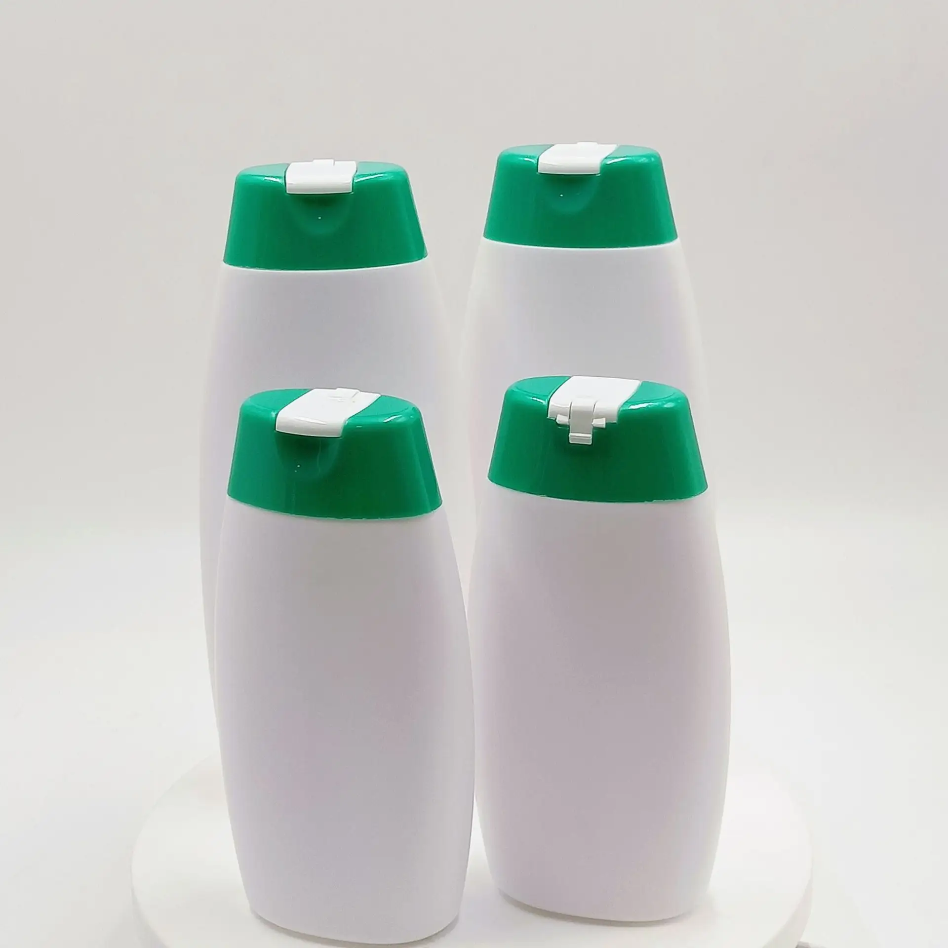 Bouteilles HDPE blanches de forme plate 200ml 400ml bouteilles d'émulsion de lotion de lavage de corps de shampooing avec le chapeau de flip pour des enfants femmes homme