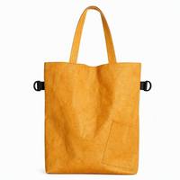 Sac fourre-tout moderne en papier DuPont, personnalisé avec logo, imperméable, lavable, résistant aux déchirures, imprimé par transfert thermique, couleur moutarde tendance