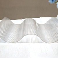 Panneaux de toiture en polycarbonate transparent ondulé pour hôtels modernes, idéaux pour les puits de lumière
