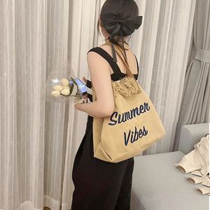Sacs fourre-tout de plage pour femmes été 2025 avec broderie, réutilisables, écologiques, grande capacité, sac à main en toile avec pompon - Product Image 2