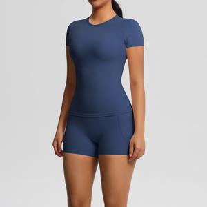 Conjunto de yoga sin costuras Top de manga corta con pantalones cortos de motorista de control de barriga Ropa de gimnasio de secado rápido para mujer - Product Image 4