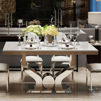 Table à manger rectangulaire en acier inoxydable argenté de luxe français avec plateau en marbre sans 6 chaises, design moderne pour utilisation en restaurant