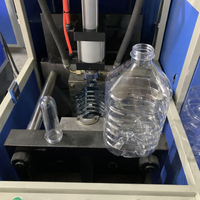 Machine de soufflage semi-automatique pour bouteilles en PET avec système de chauffage stable pour la production de bouteilles d'eau et de boissons