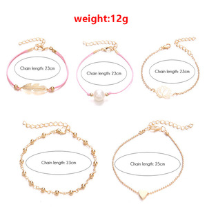 Ensemble de bracelets à breloques tendance en alliage plaqué or rose pour femmes, style bohème, avec plumes, perles, lotus et cœurs – Bijoux cadeau - Product Image 4