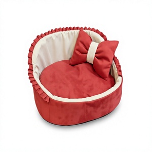 Lit de luxe ovale pour chien et chat avec bordure à volants et coussin à nœud papillon 45x45 cm. - Product Image 1