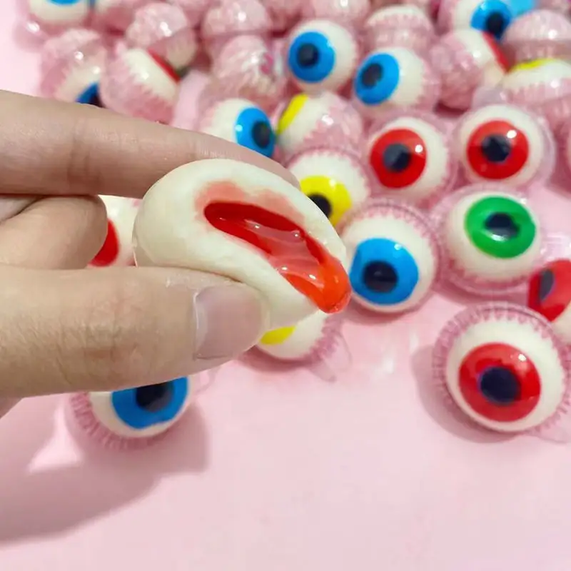 Caramelle gommose popolari di forma della palla dell'occhio dei dolci 3D Buon gusto su ordinazione il mezzo bulbo oculare interessante mastica Candy molle